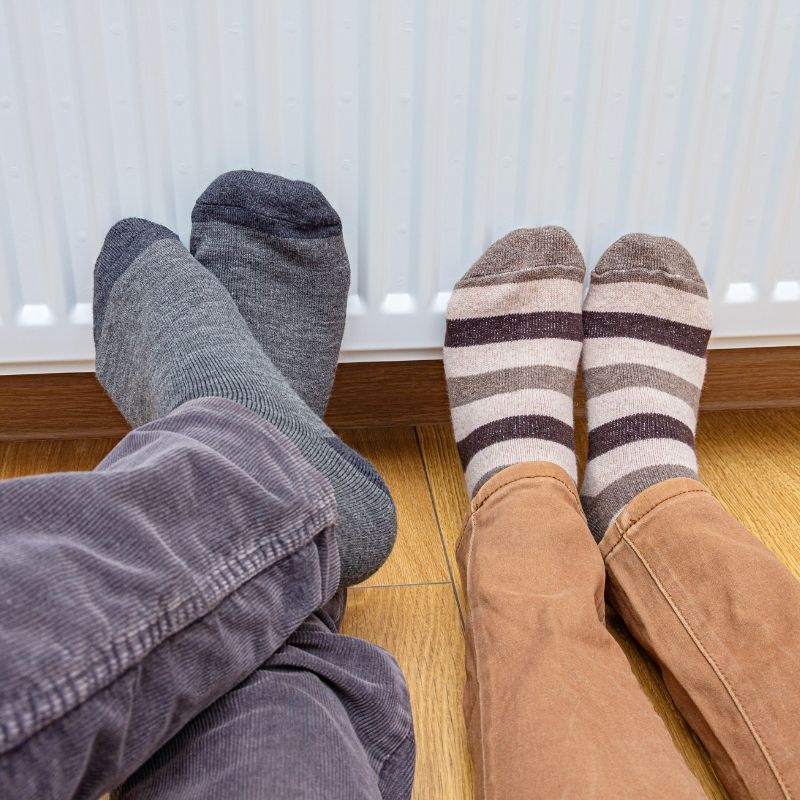 Family-with-feet-on-radiator-iStock-879125022-(2).jpg